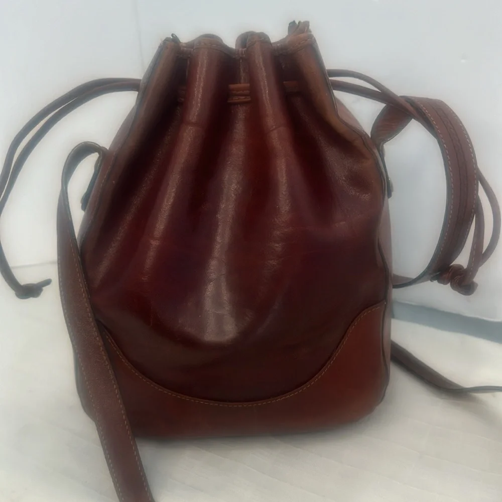 Oroton tan Molded cowhide Leather Drawstring bucket bag.